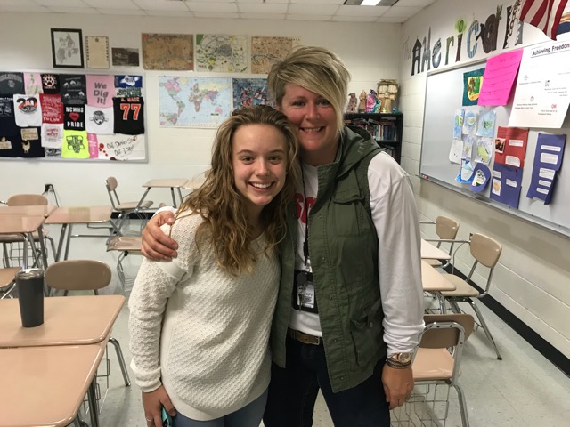 Leah+Grehan+and+Mrs.+Codron+%28left+to+right%29+pose+together+in+the+morning+while+the+school+song+played+over+the+loudspeaker.+