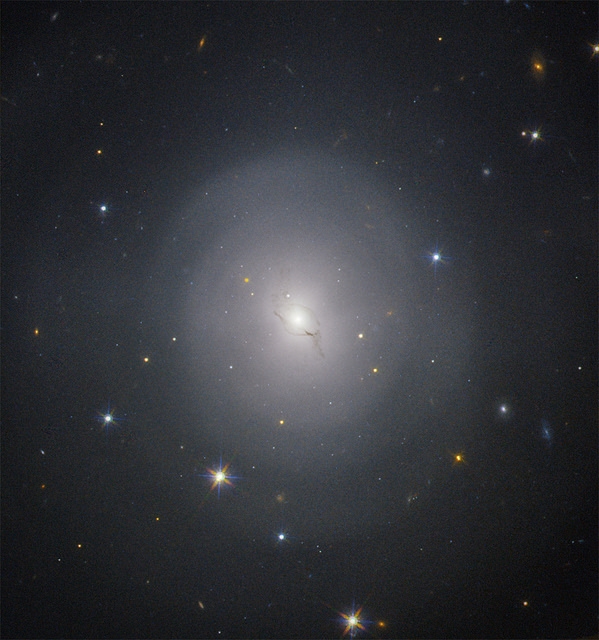 Light+rays+that+were+emitted+from+the+two+neutron+stars+impacting+captured+from+the+Hubble+Space+Telescope