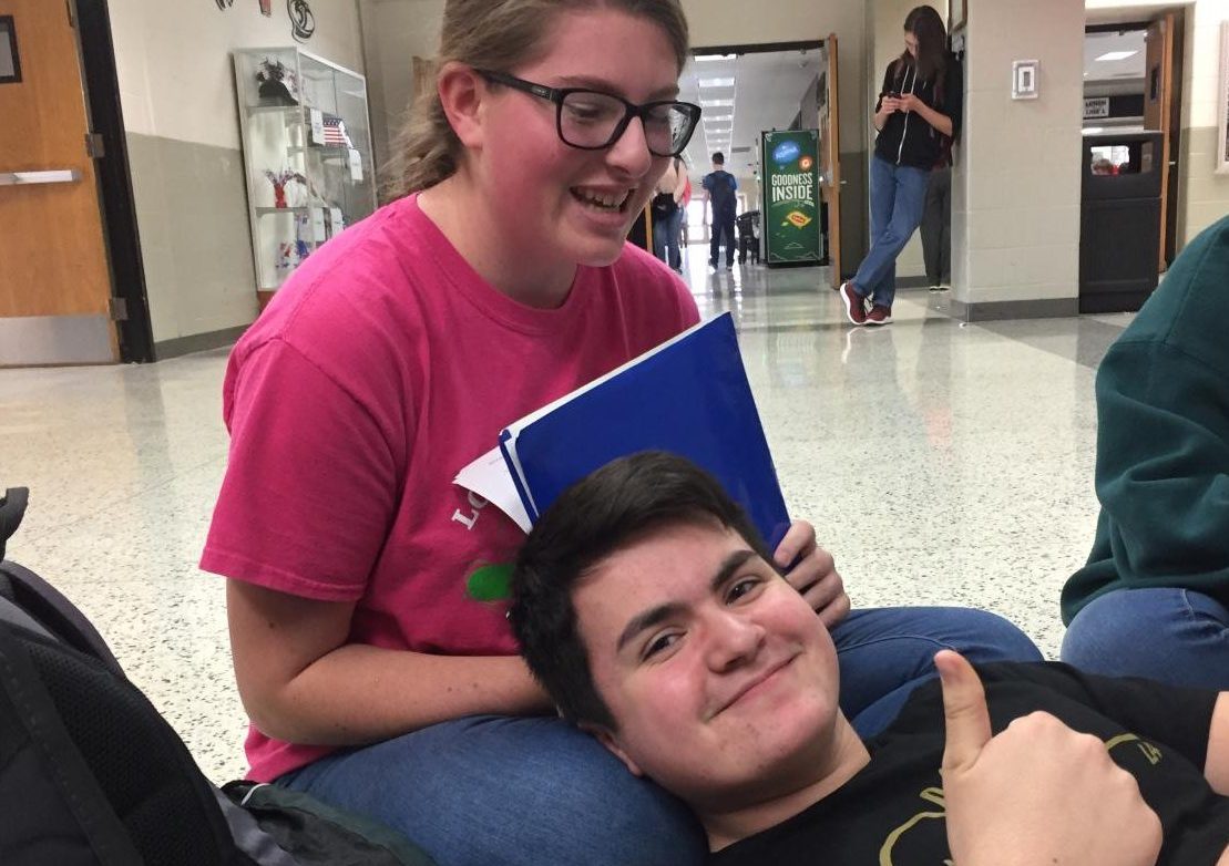 Lillian Ridinger (left) and Jason Zummallen (right) answer questions about their family’s traditions while at lunch.