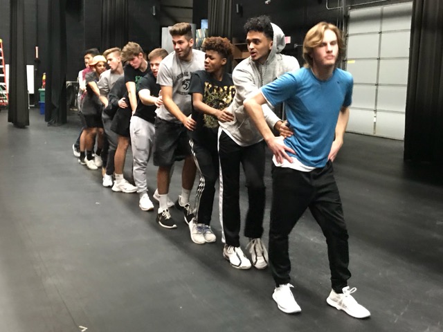 After+getting+serious+about+the+donation%2C+the+boys+got+serious+about+learning+the+group+dance.+