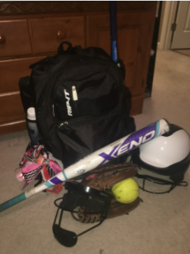 Photo of one of the players’ softball gear prepared for tryouts. Photo by Lauren Adcock.