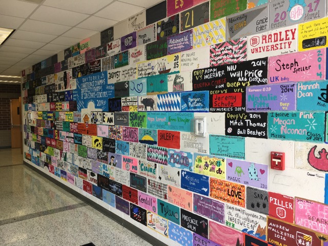 As+one+of+the+senior+activities%2C+seniors+paint+bricks+in+the+senior+hallway+at+West+Fest.+This+is+one+of+the+ways+seniors+leave+their+mark+at+Normal+West.+