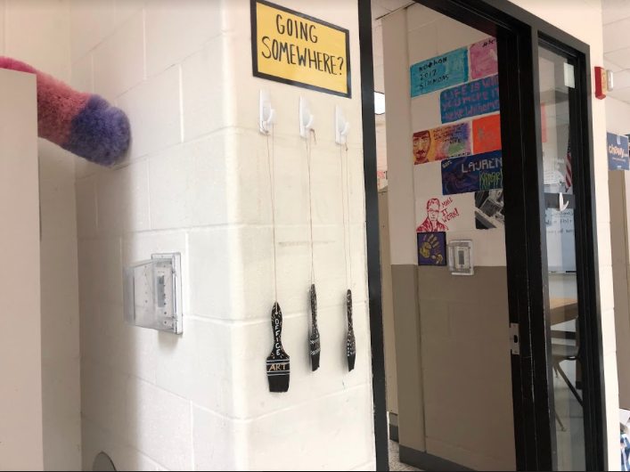 Thinking+creatively%2C+art+teacher+Ms.+Geiselman+uses+decorated+paint+brushes+with+identified+location+as+hall+passes+to+a+from+her+class.+Students+can+find+these+hanging+on+the+wall+in+her+classroom.+