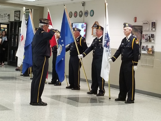 Veterans+preform+a+traditional+flag+ceremony+to+honor+the+five+branches+of+the+military%2C+while+the+Jazz+Voices+sing+the+national+anthem+at+the+NCWHS+veterans+dinner+on+11%2F13%2F2018+