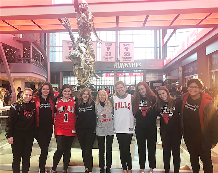 A+group+of+IE+students+stand+in+front+of+the+famous+Michael+Jordan+statue+from+the+famed+1990%E2%80%99s+team+that+has+become+a+staple+for+Chicago+history.+